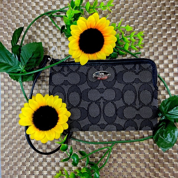 Coach Handbags - Coach small wristlet(s)- gently used but good condition! Looks new.